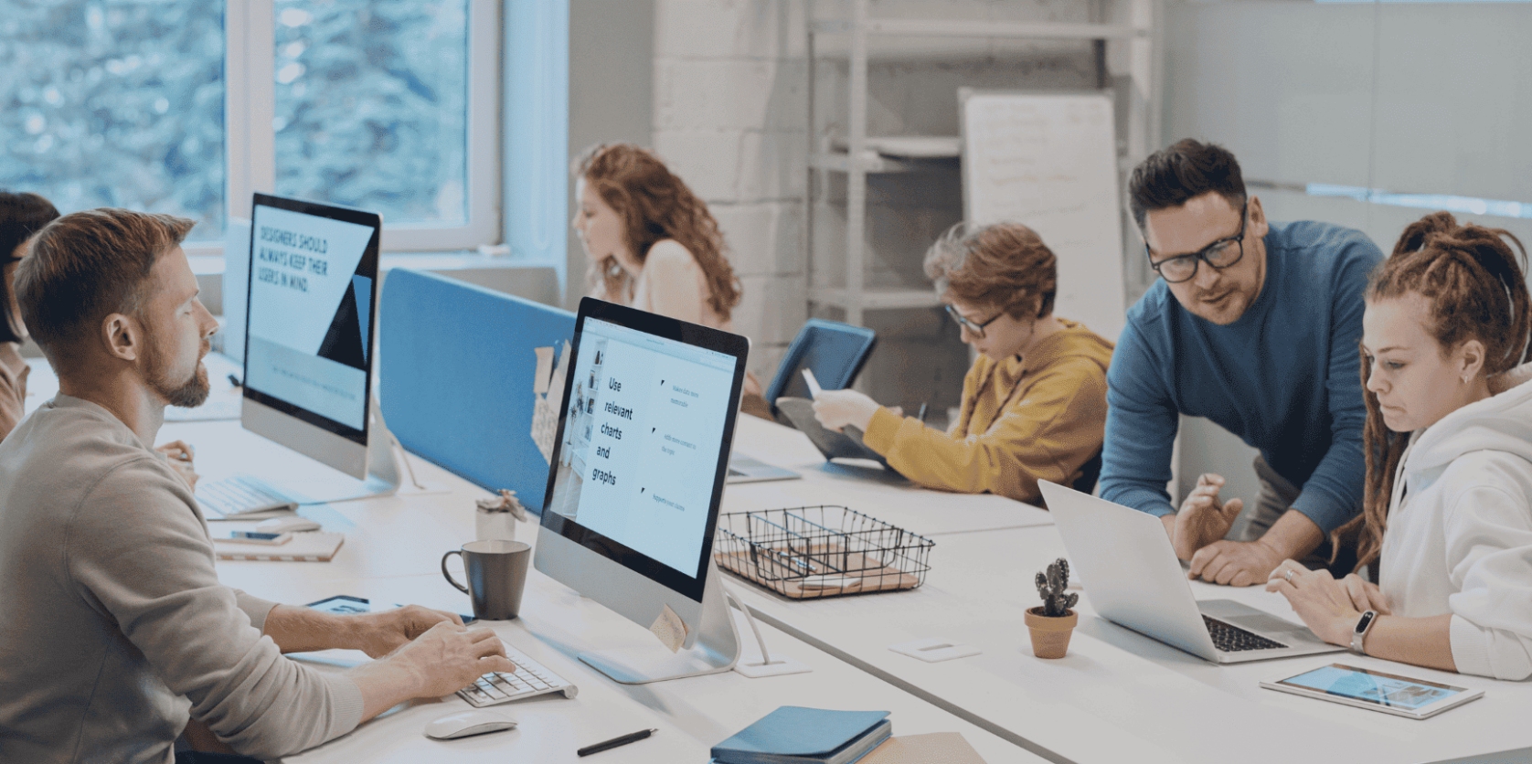 People In An Office Working Together