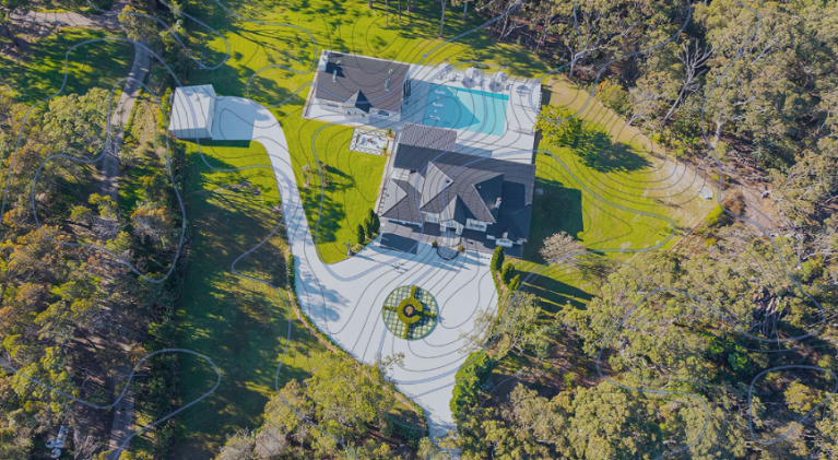 A Plot Of Land Surrounded By Trees