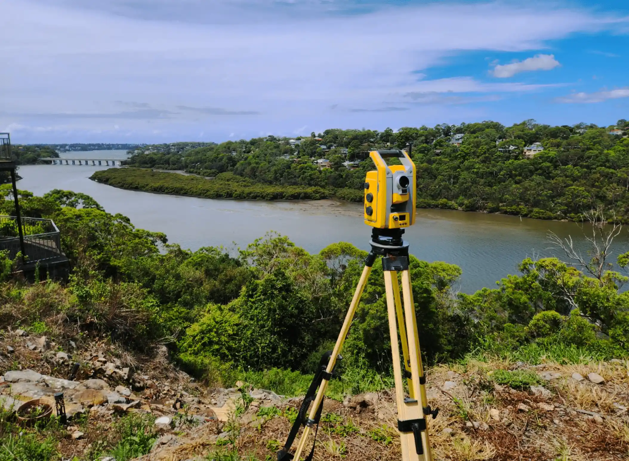 Surveying Equipment Pointed At A River